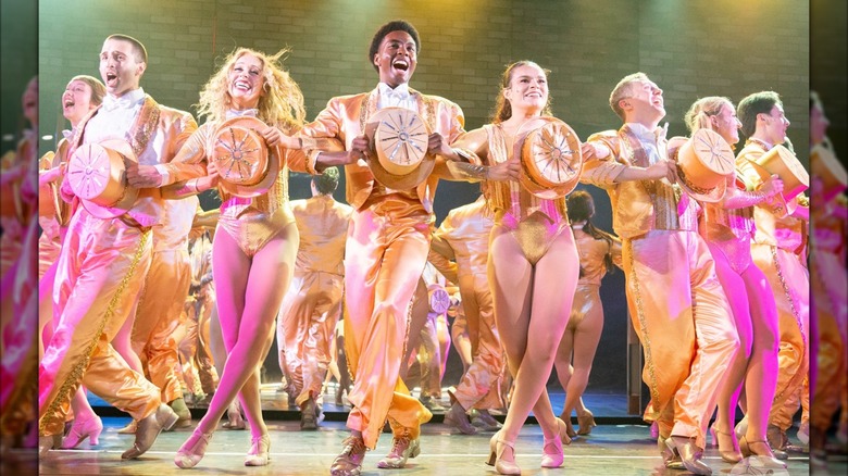 Group of performers on stage in A Chorus Line