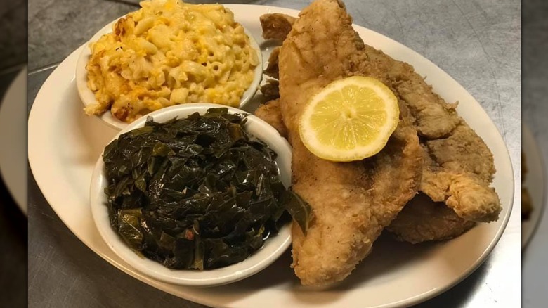 Fried fish with collard green and mac and cheese