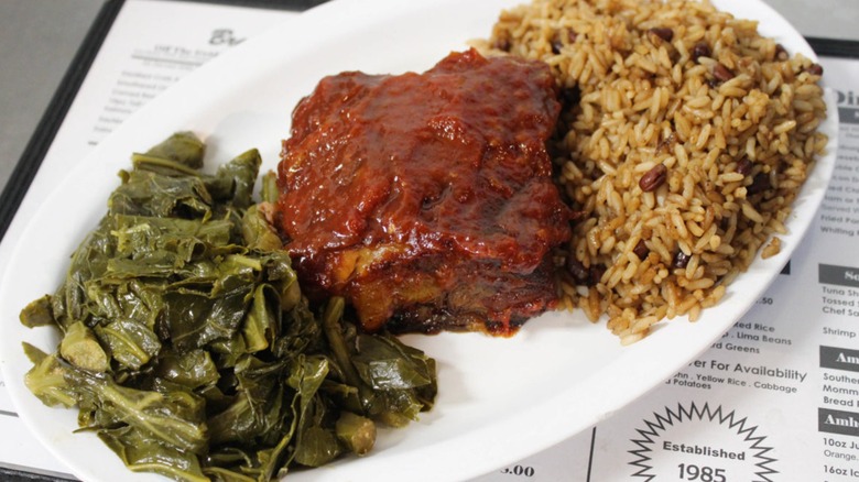 smothered beef with collard greens and dirty rice