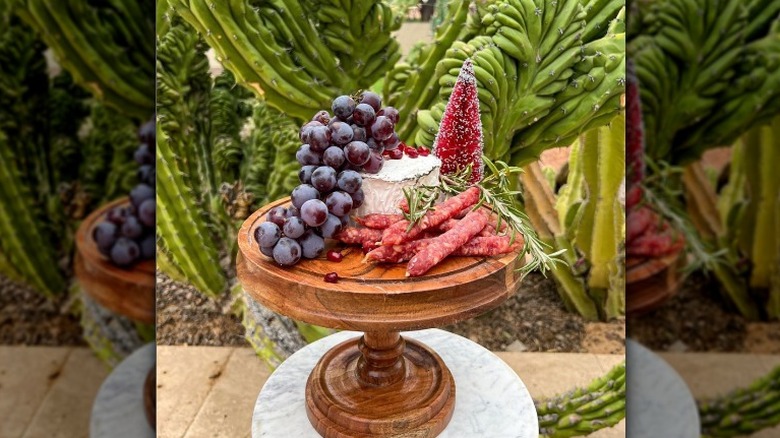 Charcuterie board with grapes and cheese