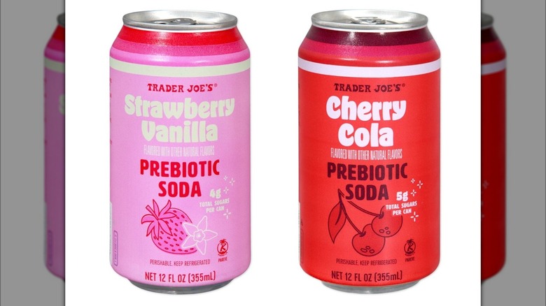 Trader Joe's Strawberry Vanilla and Cherry Cola Prebiotic Soda cans on white background
