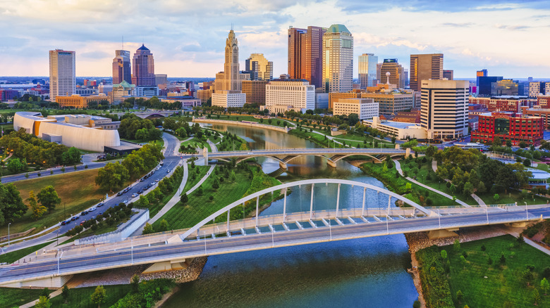 View of the Columbus, Ohio city skyline and bridge over a river