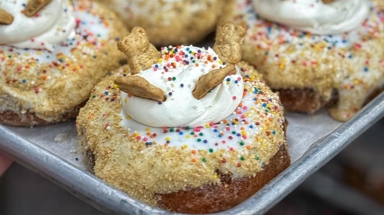 garnished donuts on tray