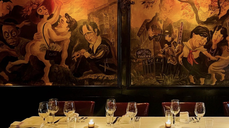 The interior of New York's Waverly Inn and its mural