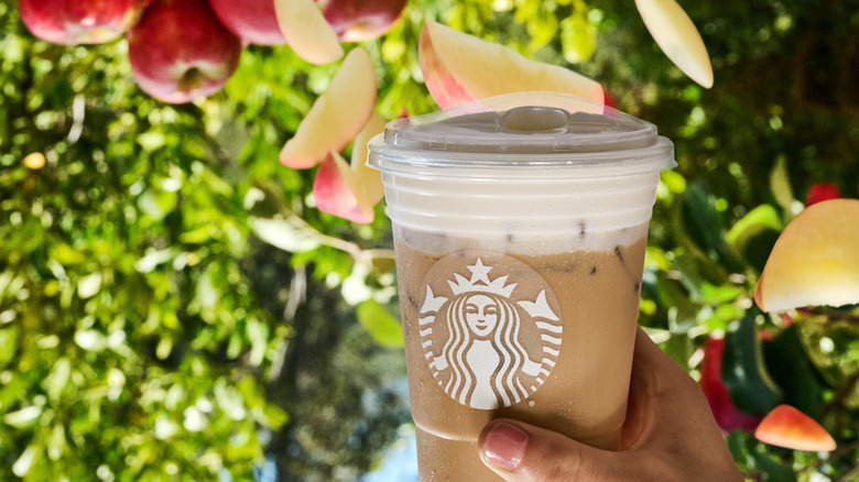 Holding an iced espresso drink