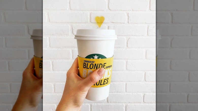 Starbucks cup with blonde espresso roast advertisement
