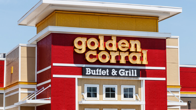 Outside Golden Corral Buffet & Grill with a sign