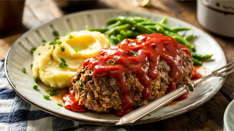 Plate with meatloaf, mashed potatoes, and green beans