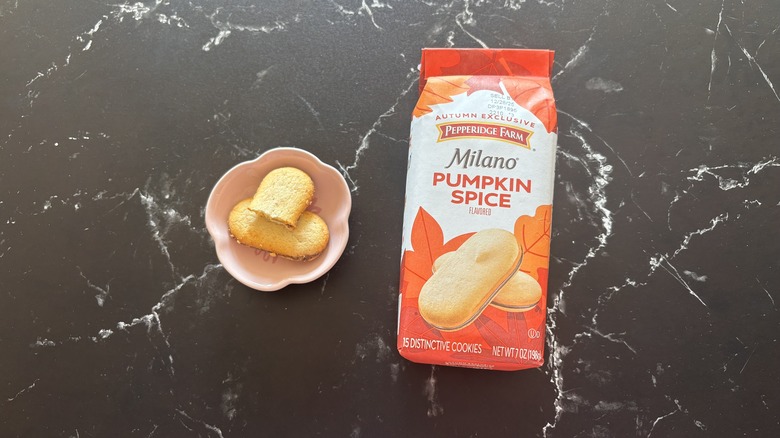 Milano pumpkin spice cookies package next to cookies in small bowl