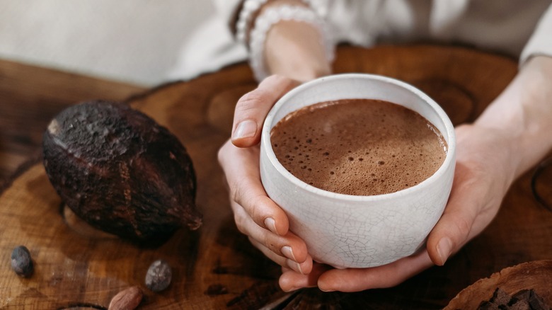 cacao pod and chocolate drink