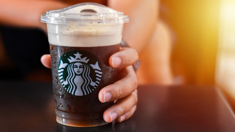 Starbucks cold brew with cream in plastic to-go cup