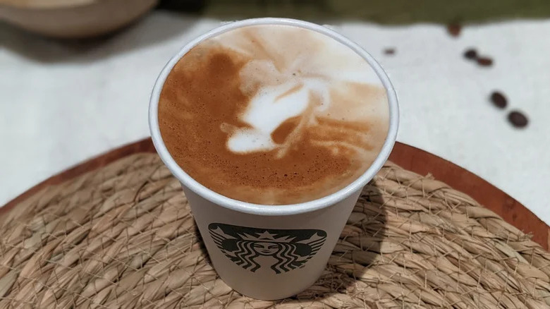 Close-up of Starbucks Cortado on table