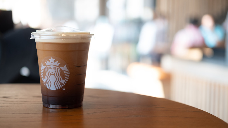 Cup of Starbucks Nitro Cold Brew on table