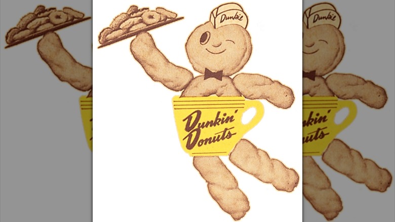 The Dunkie Dunkin' Donuts logo is pictured holding a plate of donuts.