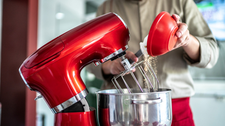 man using stand mixer