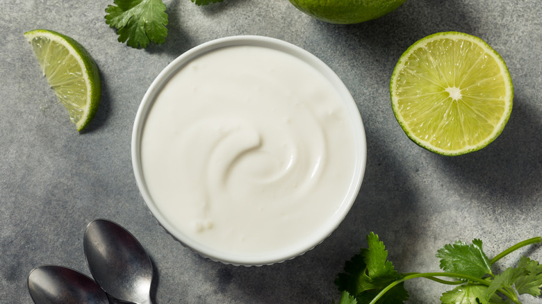 Mexican crema with lime slices 