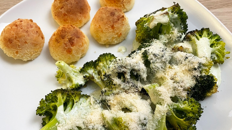 Plate of Parmesan broccoli with biscuits