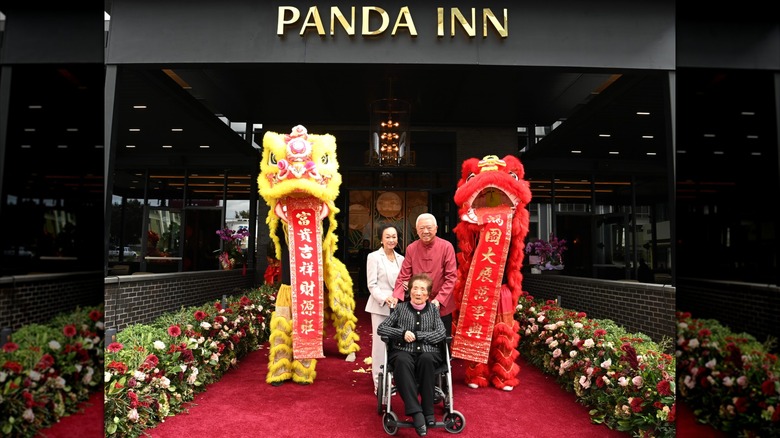 Panda Inn exterior with the Cherng family posing