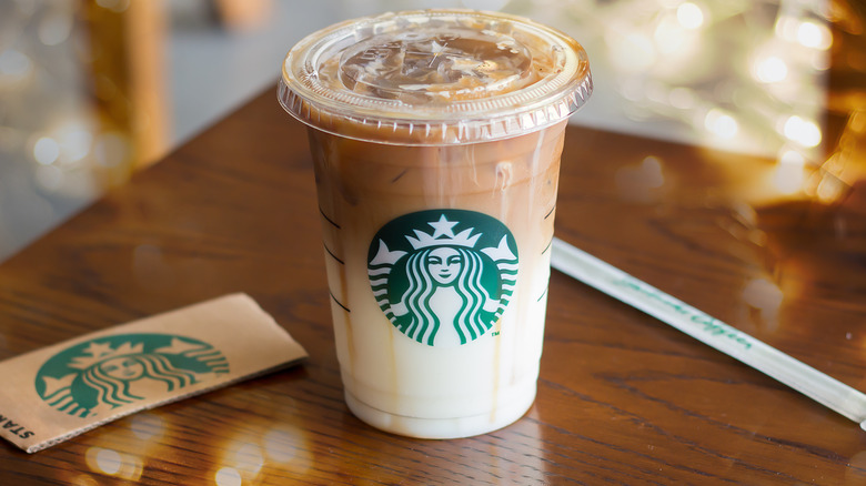 Starbucks iced latte in plastic cup