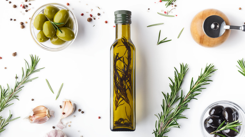 olive oil bottle with rosemary