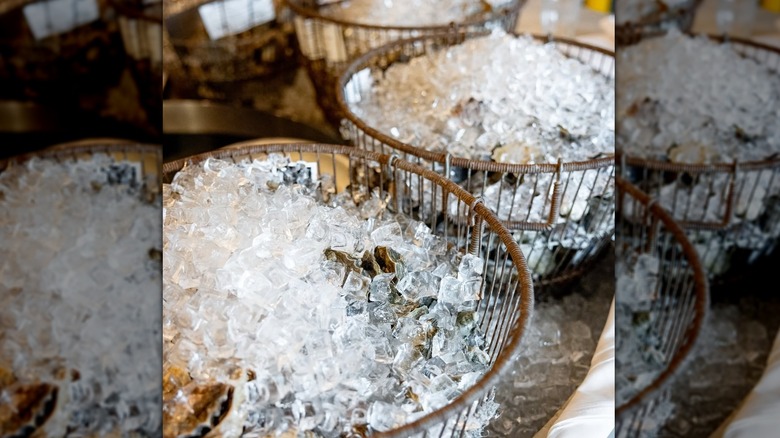 A basket of ice and oysters
