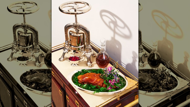 duck a la presse prepared tableside at Tourmaline