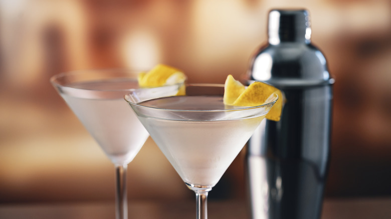 martini cocktails with lemon peels