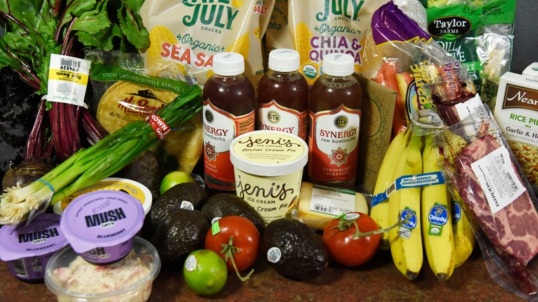 A variety of groceries neatly displayed on a counter