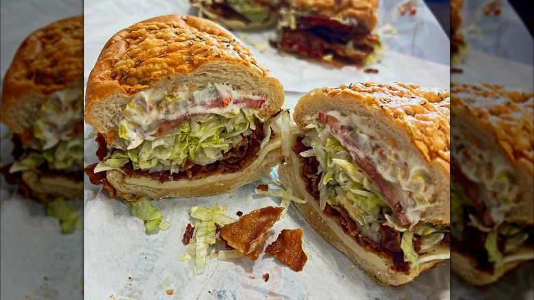 BLT sandwich from Jersey Mike's cut in half on top of wax paper