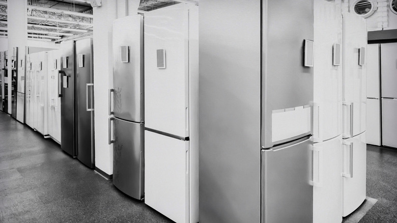 Single-door refrigerators for sale displayed in a store.