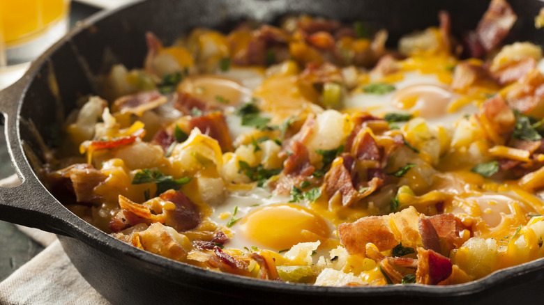 breakfast skillet with bacon eggs and potatoes