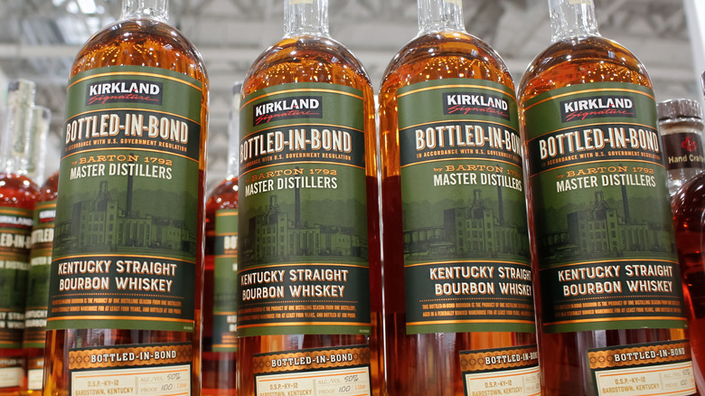 Rows of the Kirkland Signature Bottled in Bond bourbon on a shelf
