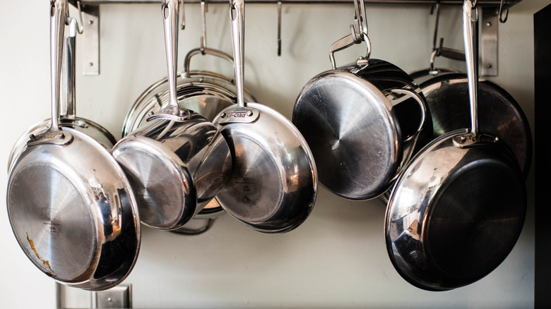 pots and pans hanging in a kitchen