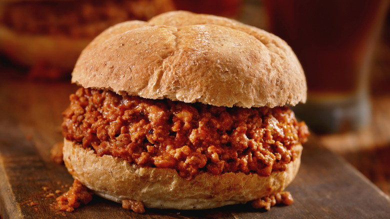 sloppy joe on a wood tray