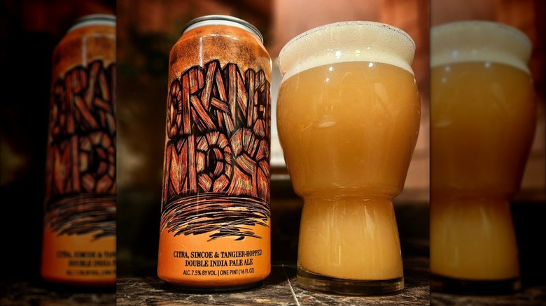 Orange Moss can with glass of beer