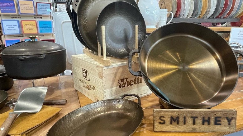 Two Smithey Ironware pans on a stovetop