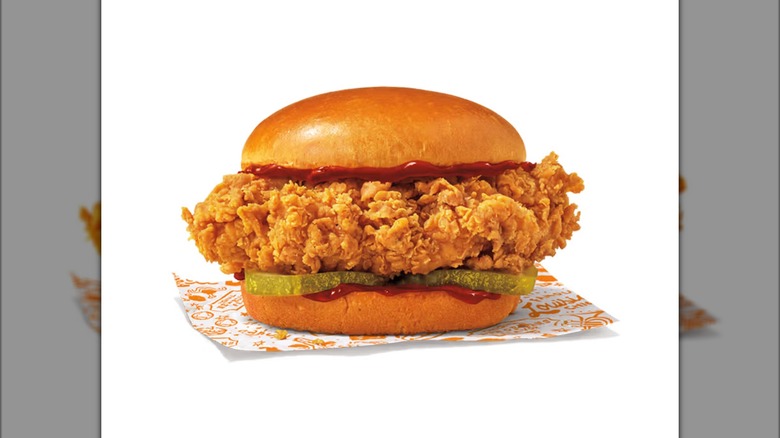 Popeyes Honey BBQ Chicken Sandwich on white background