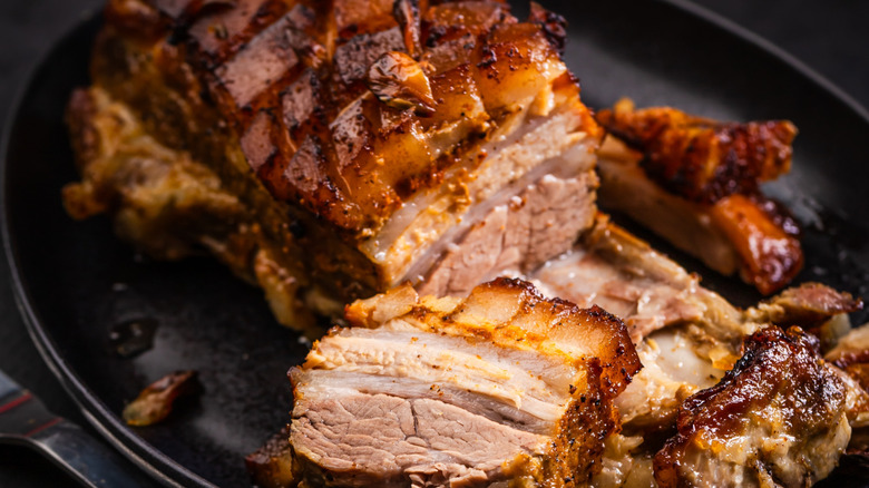 Delicious and juicy prepared pork belly with crispy skin