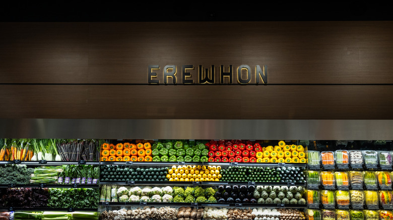 An Erewhon logo above fresh produce
