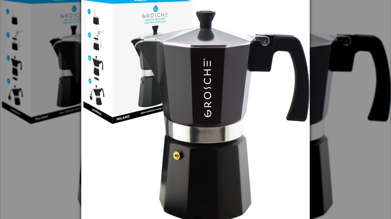Black Grosche moka pot next to the box it comes in