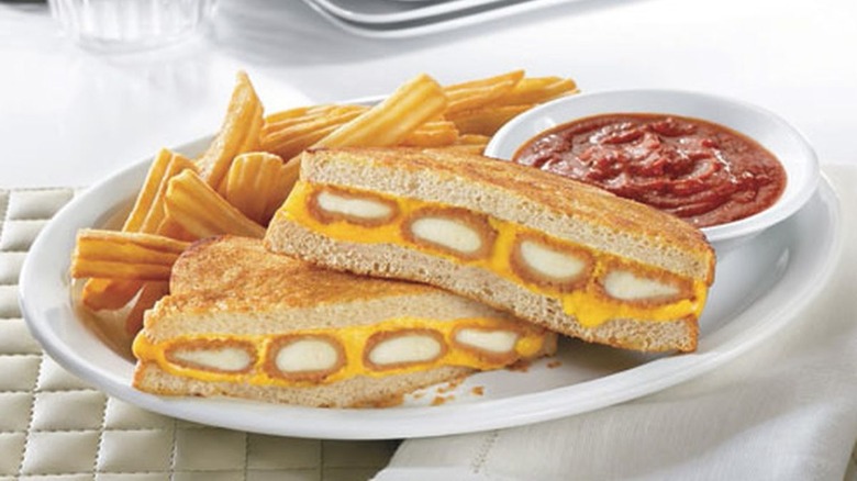 Denny's fried cheese melt with marinara sauce and fries