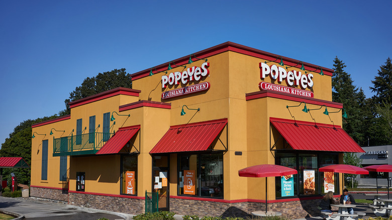 Outside of Popeyes restaurant on a sunny day