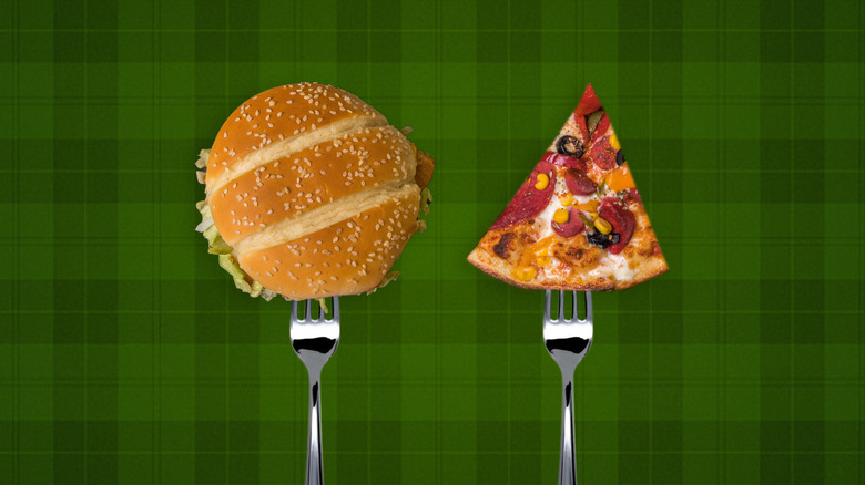 Burger and pizza on forks