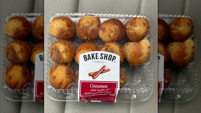 Mirrored image of packet of Bake Shop Mini Muffins on car seat, mirrored image