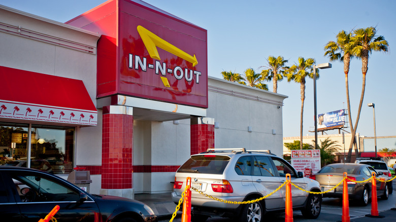 In-N-Out drive through line with cars