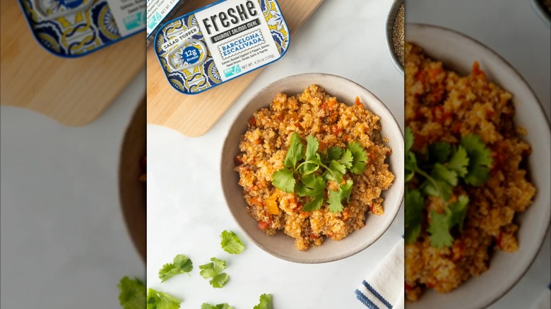 Henry & Lisa's Natural Seafood tinned salmon over a bowl quinoa
