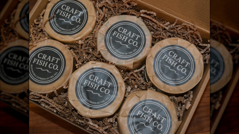 Cans of Craft Fish Company Albacore in Extra Virgin Olive Oil packed in a box