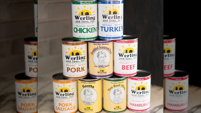 Werling & Sons stack of varied canned meats on a counter
