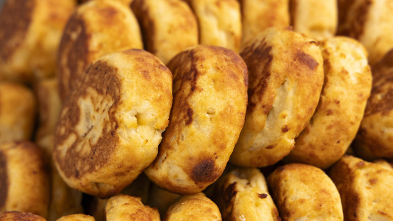 Closeup of small arepas lined up