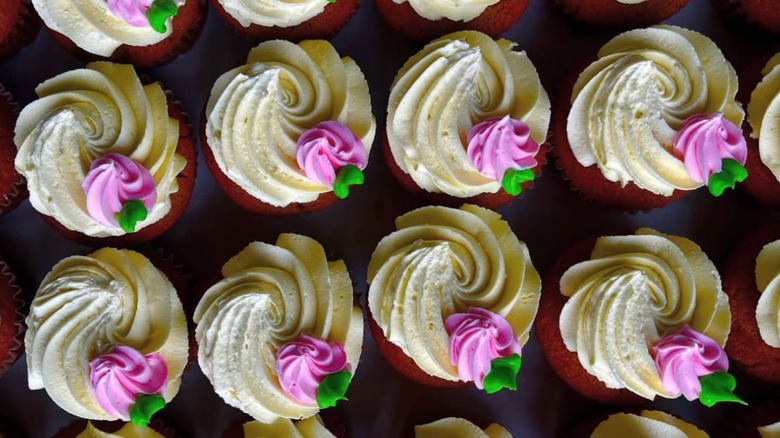 gluten-free cupcakes with decorative icing on them
